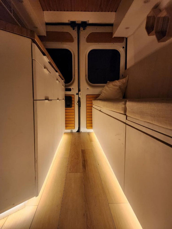  perfect for your next road trip adventure.|Spacious RV rental interior with modern kitchen