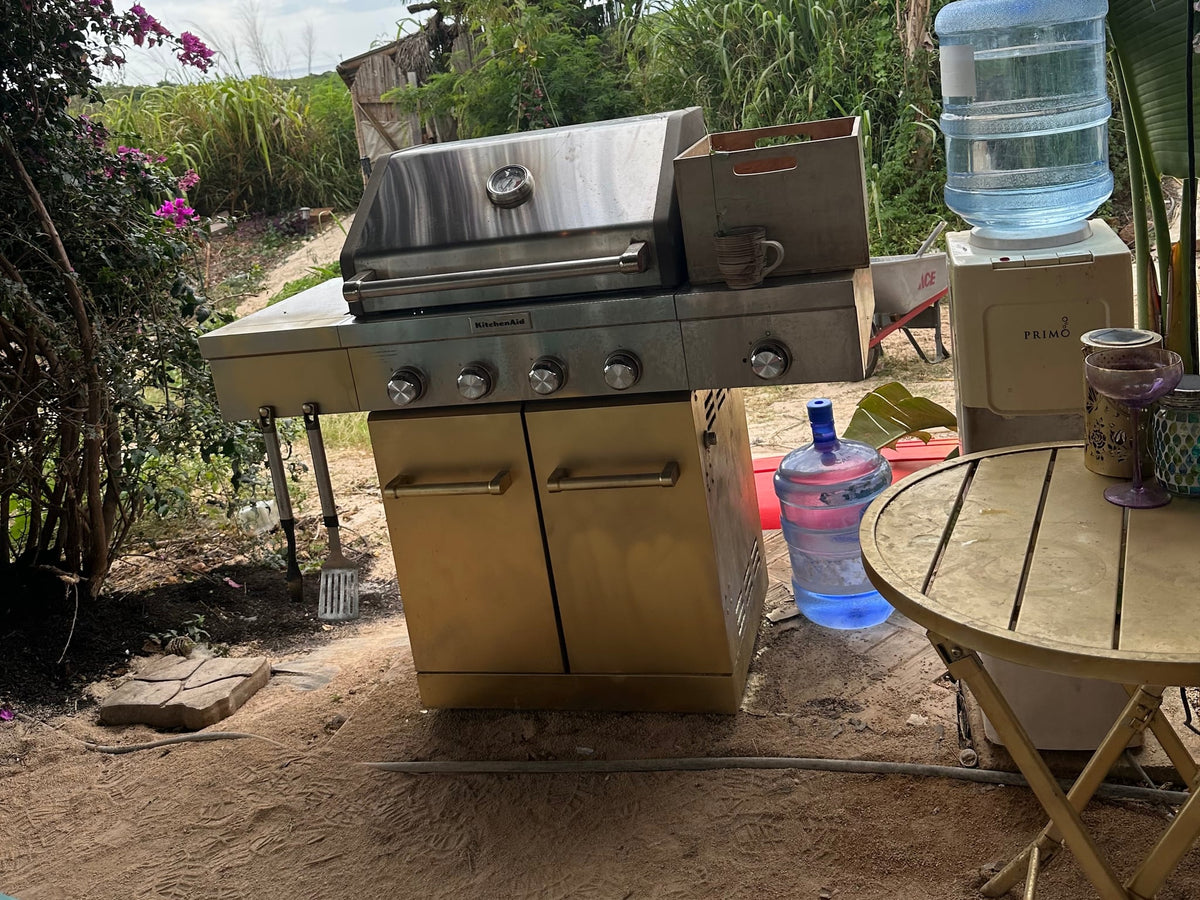  and sturdy frame.|A vibrant outdoor kitchen setup with wooden shelves displaying dishes — photo 7