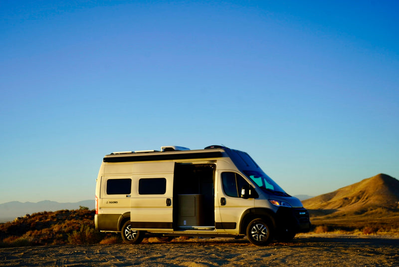 and dining area.|This RV rental's cozy camper van interior features a well-equipped kitchen — photo 8