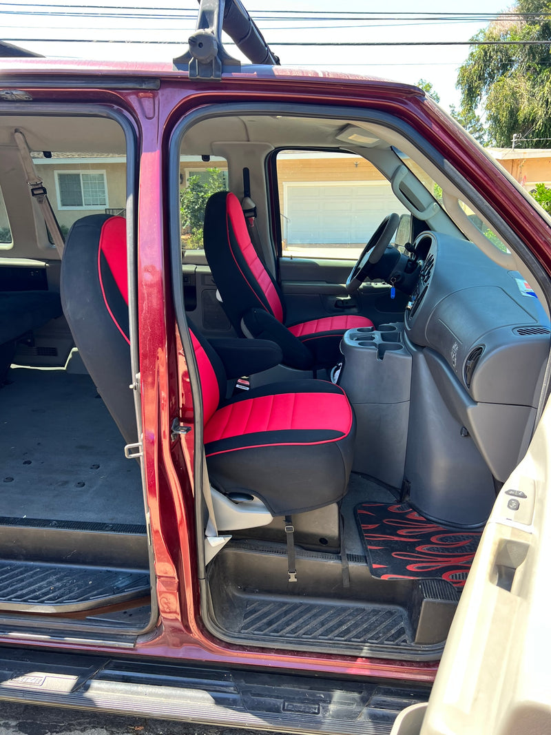 Spacious van interior with red/black seats, ideal for rv rental adventures. Open side door reveals dashboard & rear area for travel. — photo 2