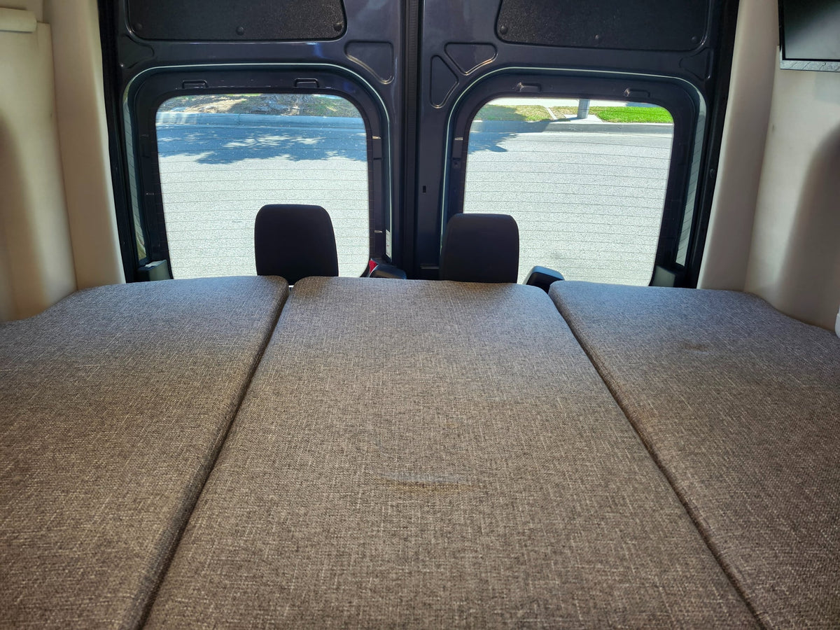  featuring side steps and a roof AC unit.|RV rental interior: two passenger seats — photo 4