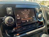 RV rental: Dashboard infotainment system playing "Spirit In The Sky." Volume, screen, media controls visible for easy navigation.