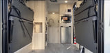 RV rental interior: versatile space with fold-away bunk beds, kitchen (sink, microwave, fridge). Ideal for travel.