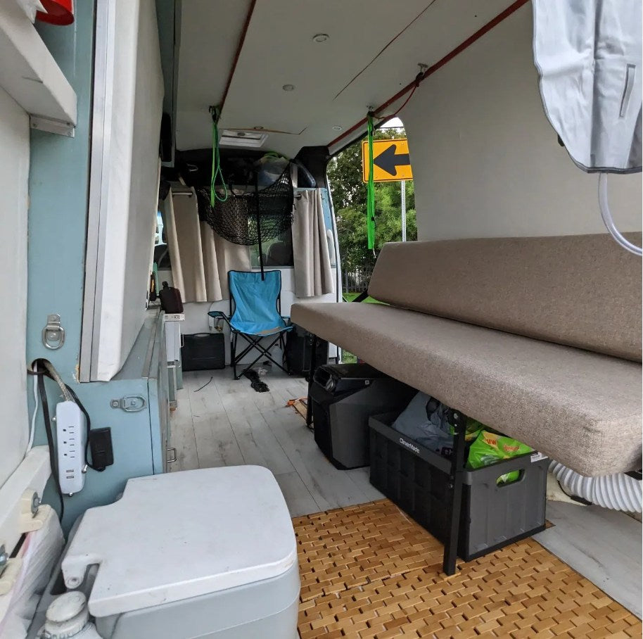  and blue Blendjet appliances. Practical for travel.|This RV rental kitchenette features dual stainless steel sinks — photo 10