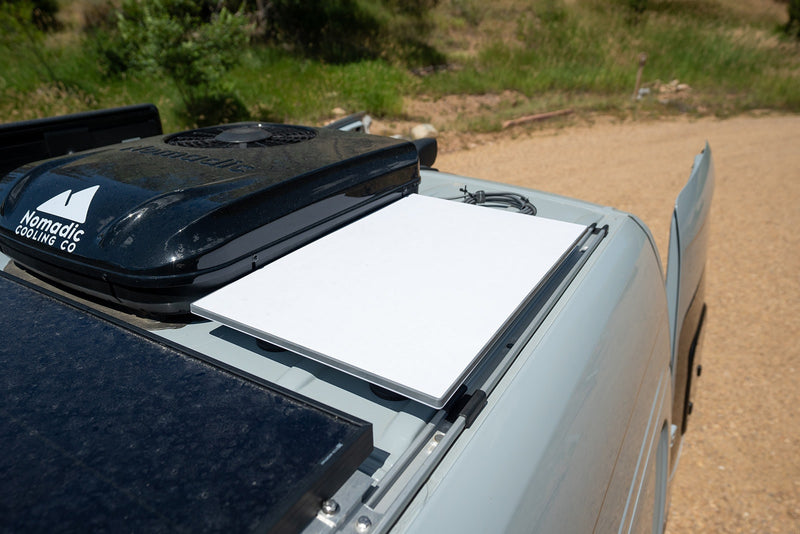 Equipped RV rental roof: Nomadic Cooling AC, solar panel, Starlink dish ready for your adventure. — photo 15