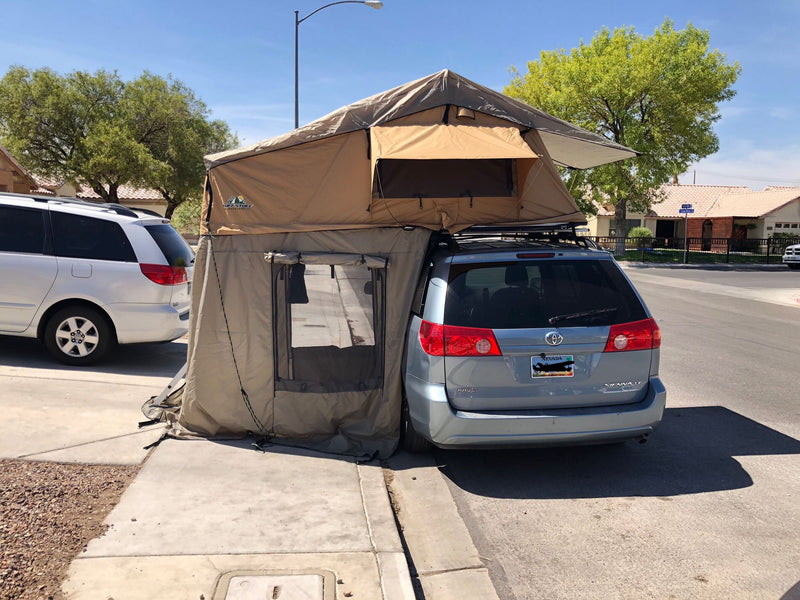  and outdoor camp setup. Perfect for family travel.|Explore with this minivan RV rental featuring a rooftop tent and ground annex — photo 4