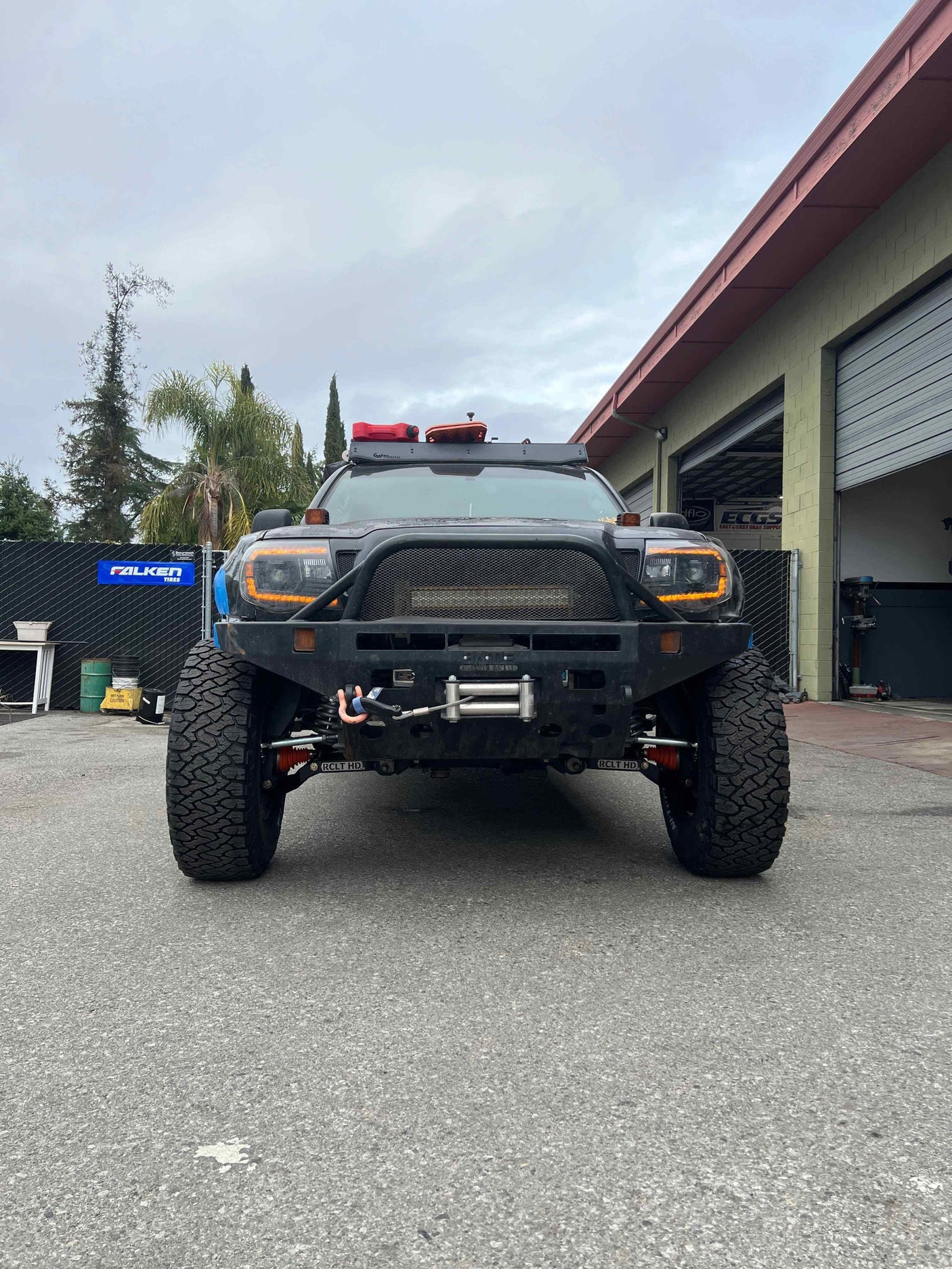 A rugged, modified off-road truck with Falken tires, winch, and roof rack. Ideal for adventures where an rv rental won't go.