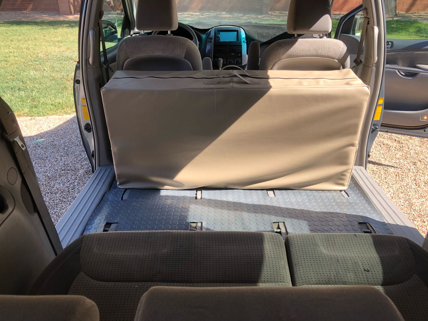  perfect for road trip travel.|Minivan with open trunk packed with yellow-lid storage bins — photo 11