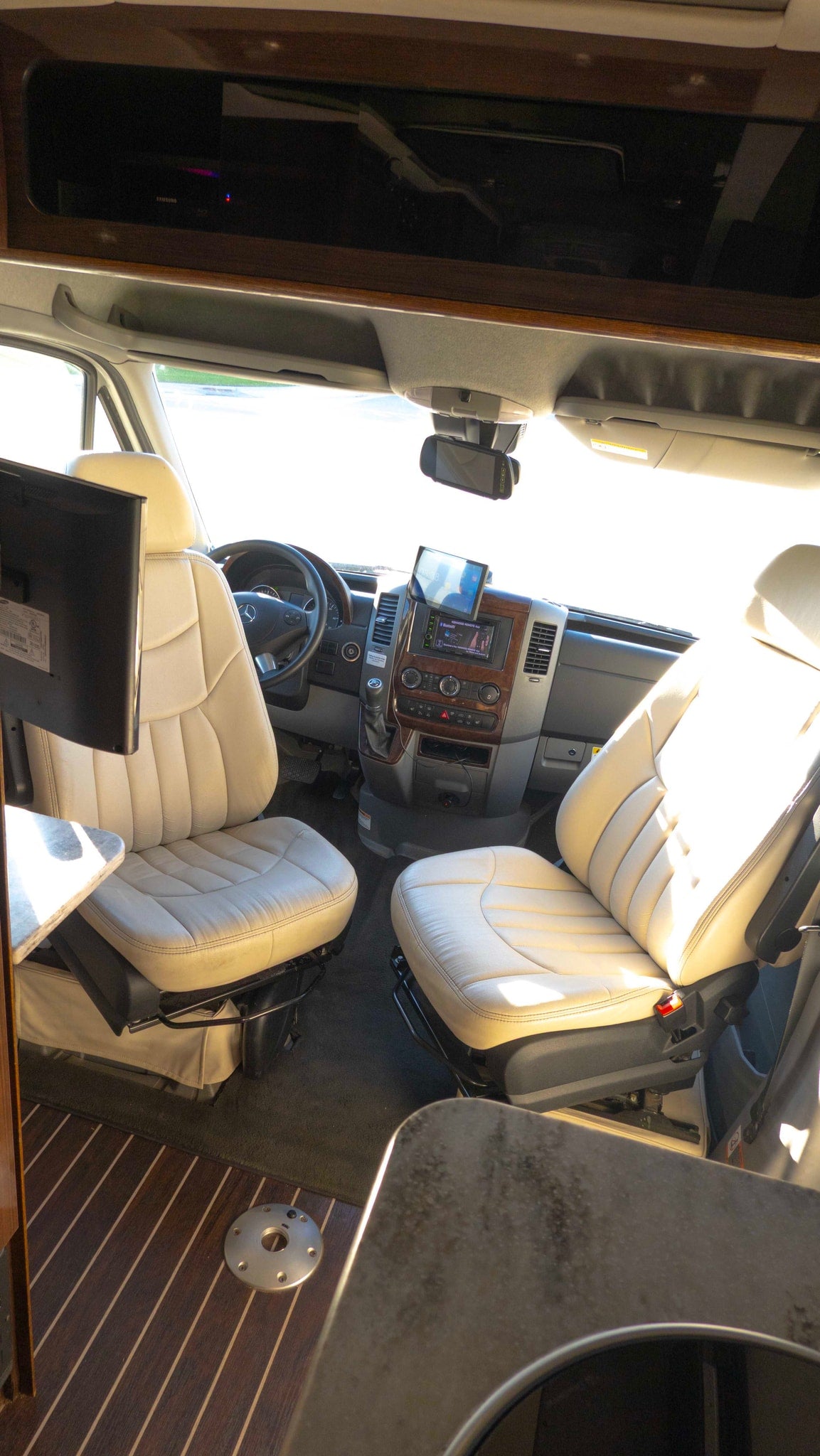 and plush seating.|Experience fresh air in your rv rental with this open side door featuring a mesh screen — photo 19