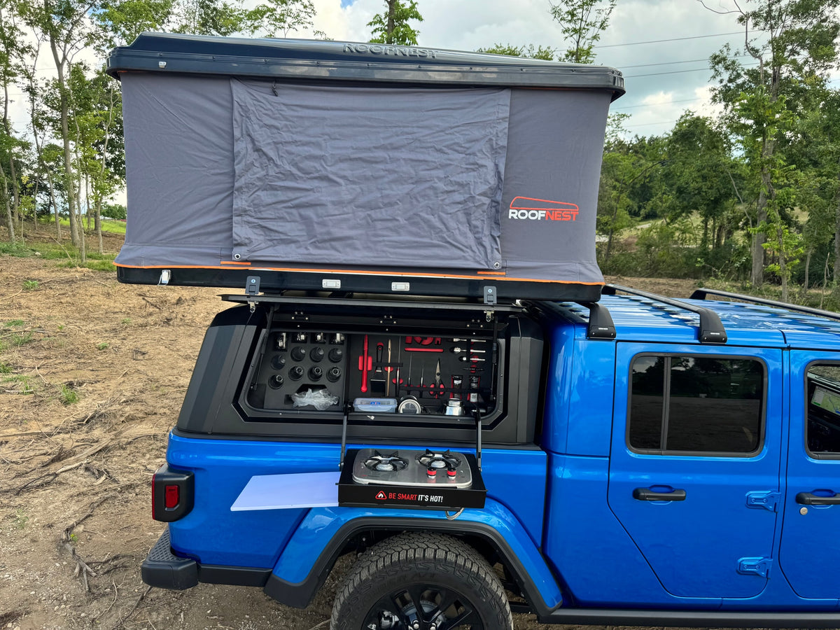  outfitted with a Roofnest rooftop tent & organized kitchen. Ready for your next overland adventure.|A vibrant blue Jeep Gladiator — photo 15