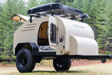 Explore with this rugged Oregon Trail'R teardrop camper rv rental, complete with a rooftop tent for off-road adventures.