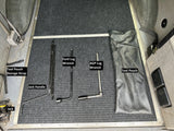 RV rental essential tools: jack, handle, Ford/AGP lug wrenches, and storage pouches for vehicle maintenance.