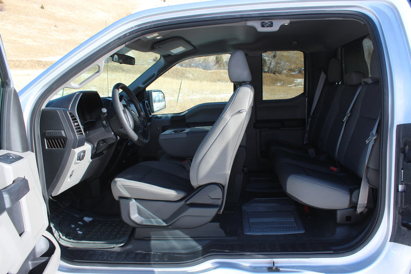 Spacious Ford F-150 crew cab interior, perfect for an rv rental adventure, showing detailed front & rear seating. — photo 3