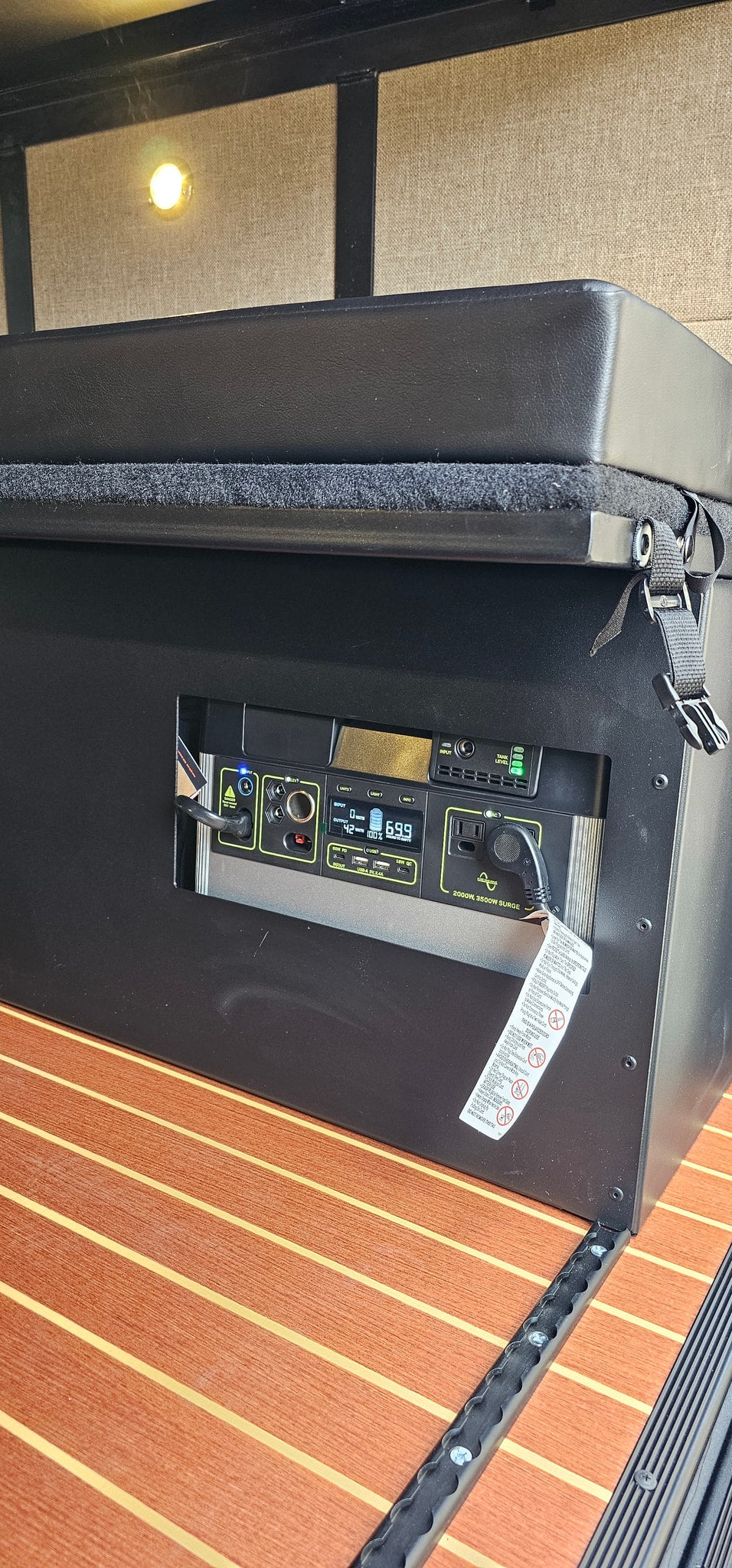  and wooden accents.|Cozy RV rental interior featuring a comfortable bed — photo 20