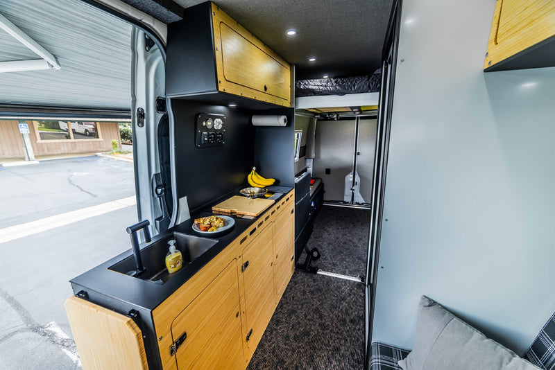  and an extended awning.|White camper van with awning extended — photo 3