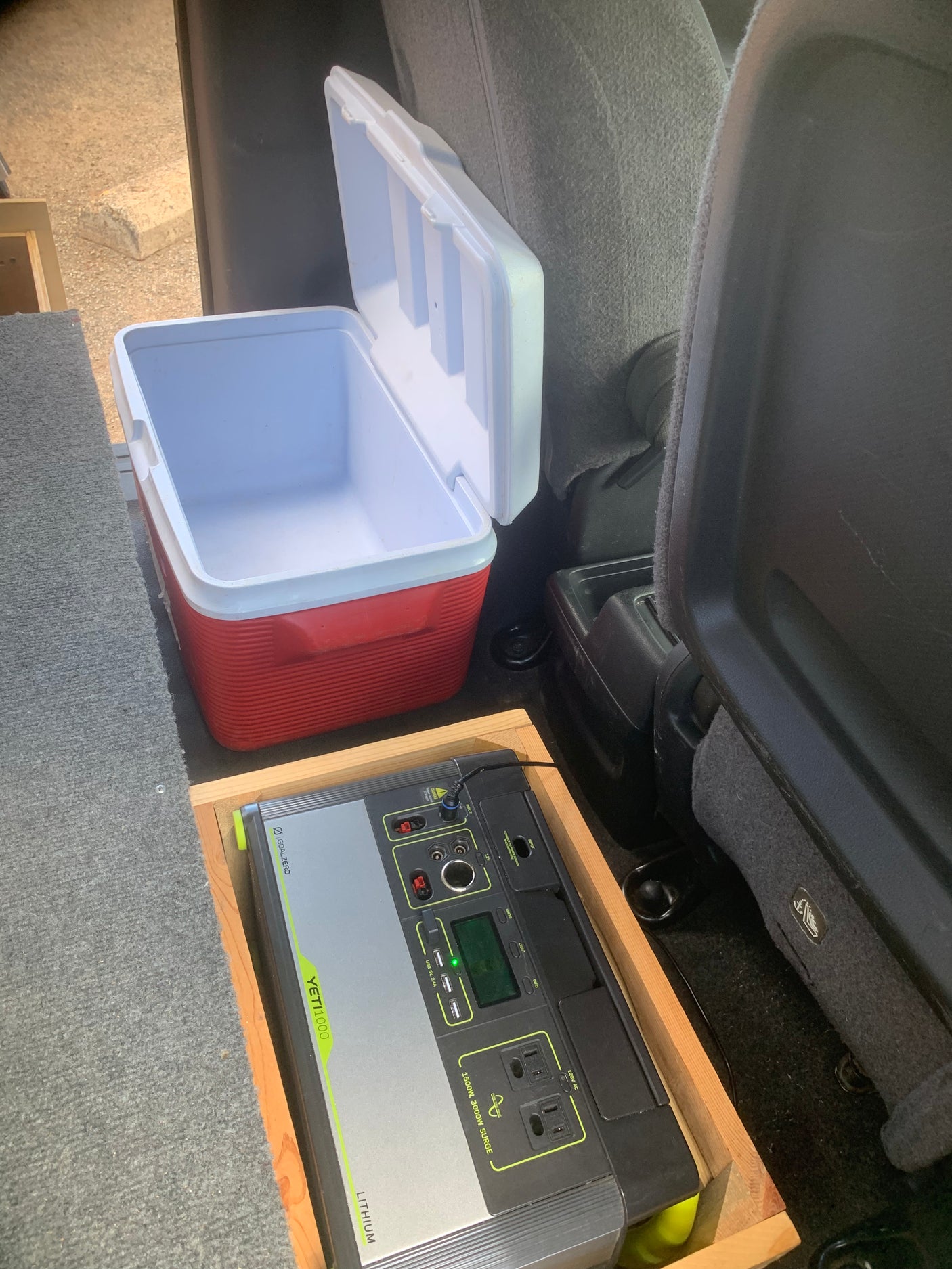 RV rental setup: Goal Zero Yeti 1000 portable power station and cooler secured in the vehicle interior.