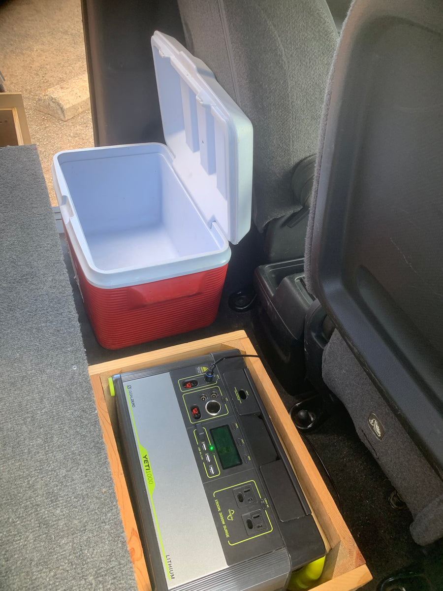 RV rental setup: Goal Zero Yeti 1000 portable power station and cooler secured in the vehicle interior.