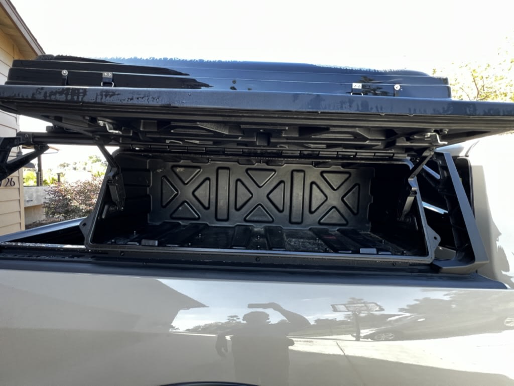  & water tank on a rack. Great for your next RV rental.|A beige pickup truck — photo 4