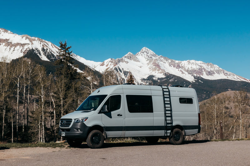 Scenic RV rental parked on a mountain road — photo 1
