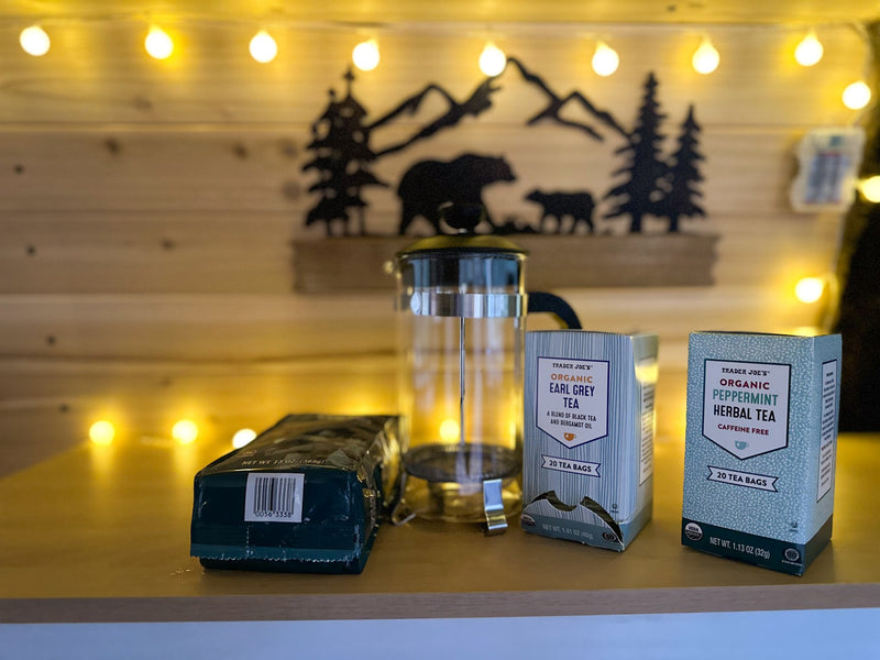  and custom wood paneling.|Cozy RV rental interior features wood paneling — photo 6