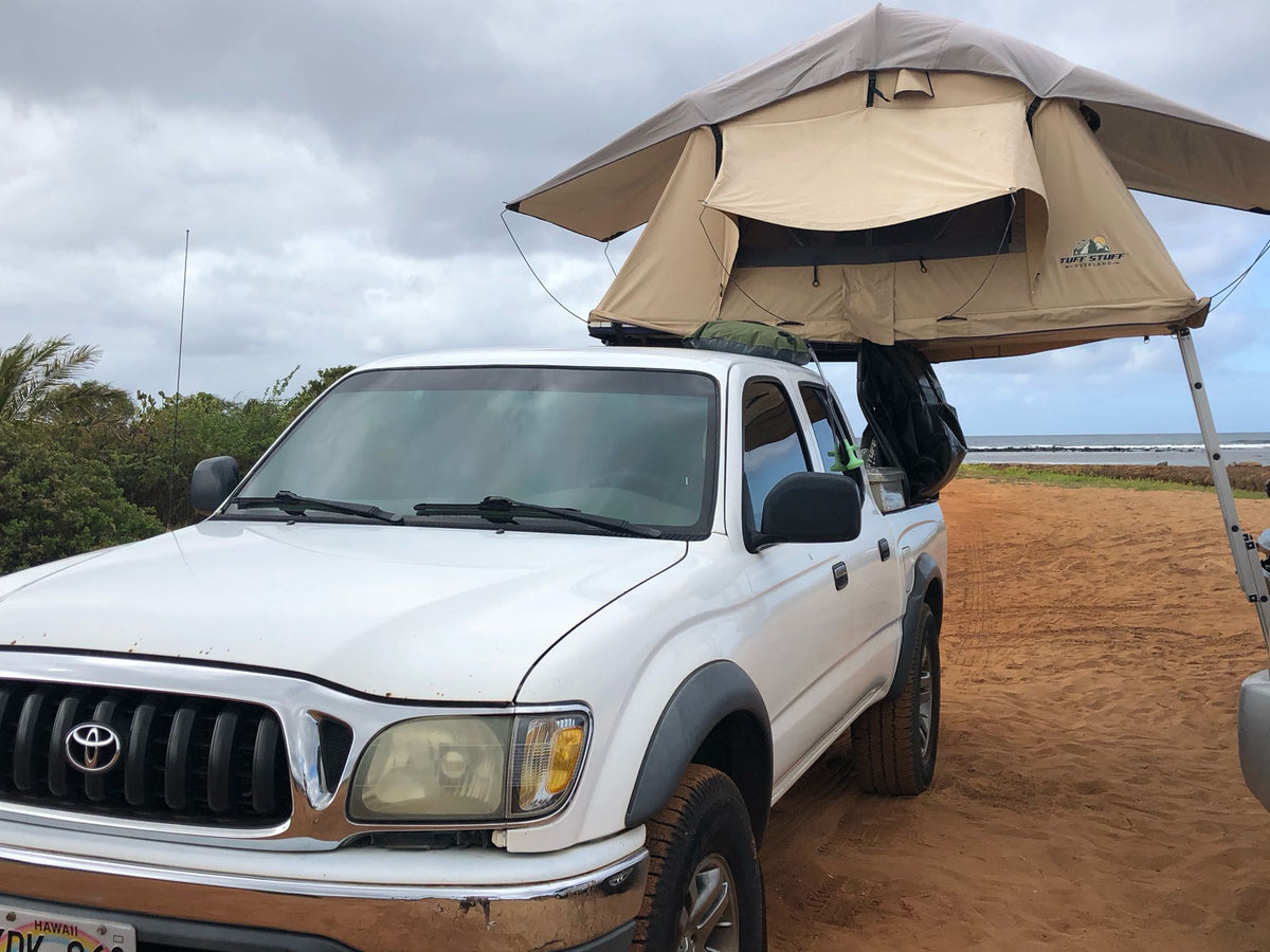  waves visible.|Relaxing beach sunset with an outdoor kitchen setup and chairs. Perfect for an RV rental escape!|Beach day setup: colorful chairs — photo 1