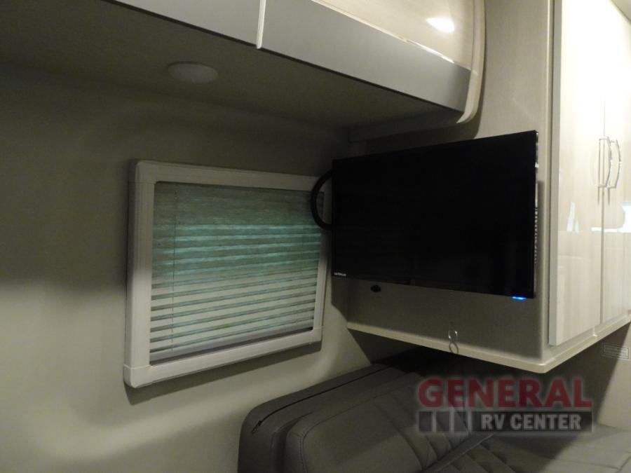  and bright interior for travel.|RV rental interior: Mercedes-Benz Sprinter cockpit with dashboard — photo 9