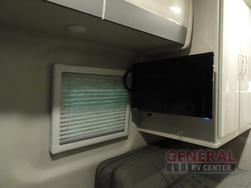  and bright interior for travel.|RV rental interior: Mercedes-Benz Sprinter cockpit with dashboard — photo 9