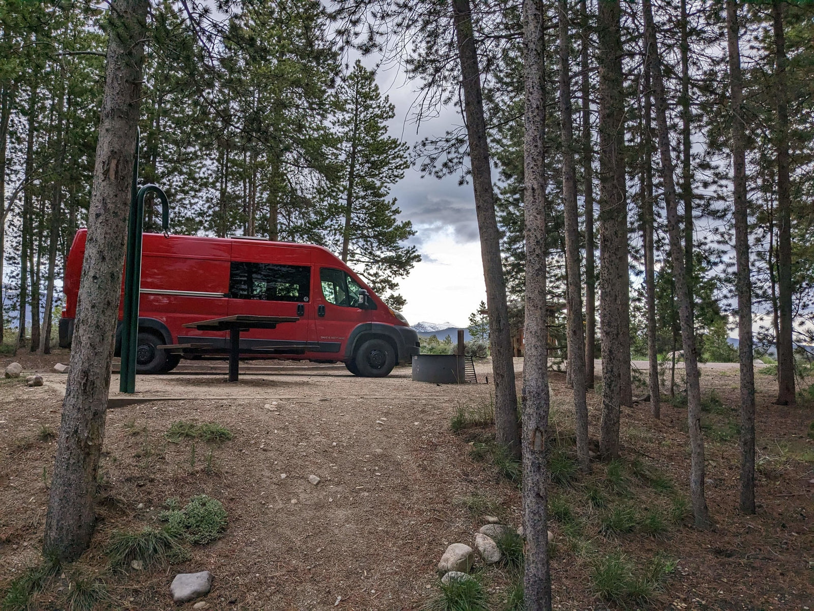  and a wood plank ceiling.|An RV rental Camco portable toilet