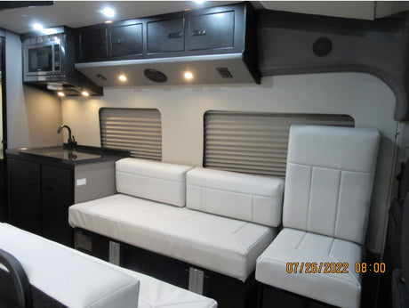  and the cockpit beyond.|Silver Ford Transit camper van