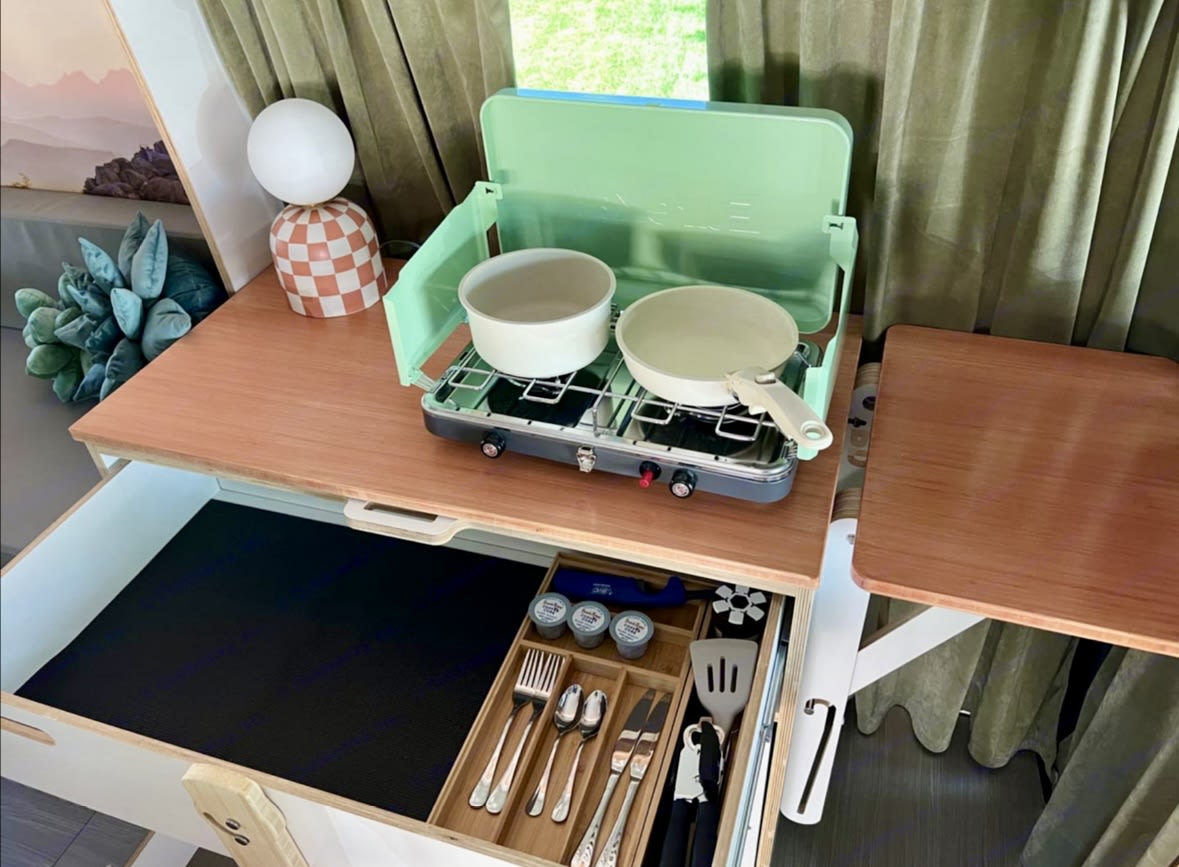  and ample storage. Ideal for van life adventures.|Step inside this cozy rv rental — photo 10