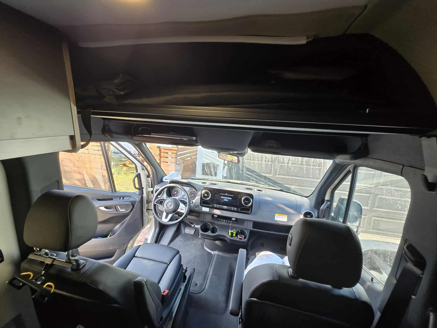  perfect for family road trips.|This RV rental's spacious interior features a comfortable upper bunk bed & ample lower storage — photo 20