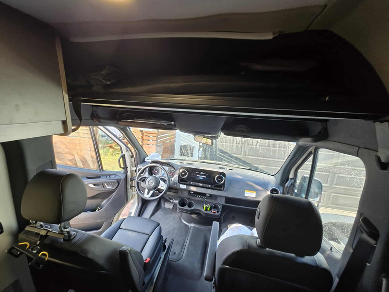  perfect for family road trips.|This RV rental's spacious interior features a comfortable upper bunk bed & ample lower storage — photo 20