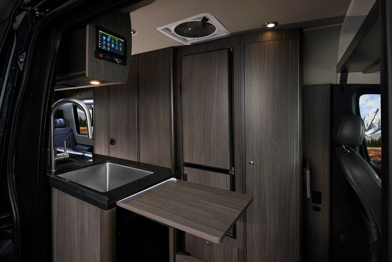  sleek kitchen with sink & stove — photo 8