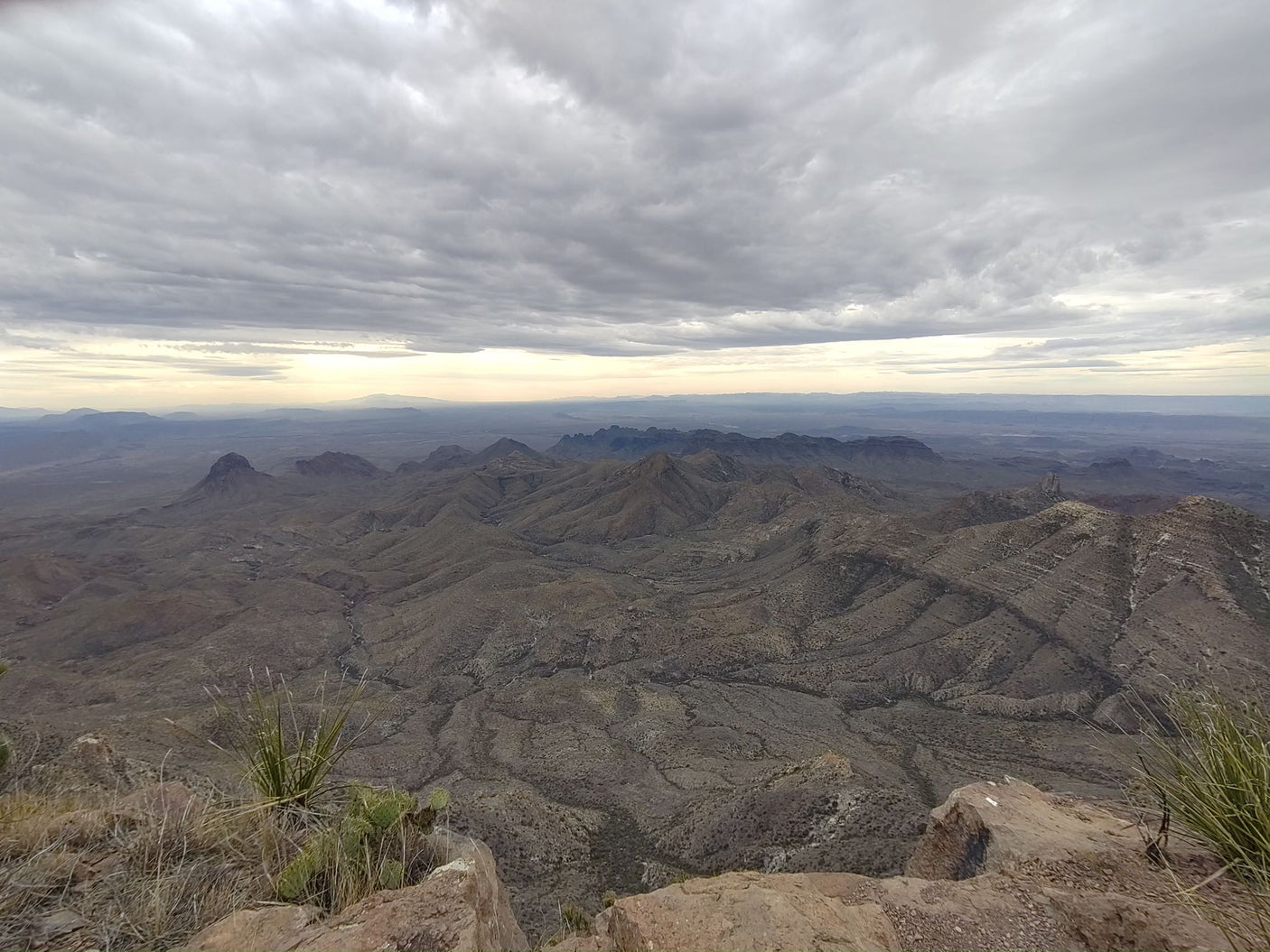 High vantage point overlooking vast arid mountains & desert valleys. Explore this remote beauty with an RV rental.