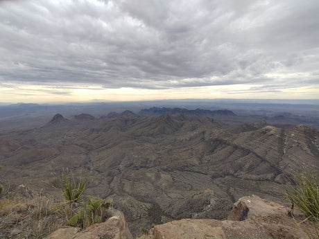 High vantage point overlooking vast arid mountains & desert valleys. Explore this remote beauty with an RV rental.