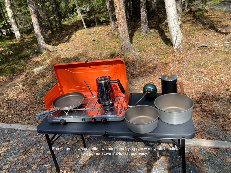RV rental ready: Outdoor cooking setup with two-burner stove, French press, kettle & pans for delicious camp meals. — photo 12