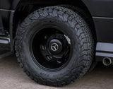Rugged BFGoodrich all-terrain tire on a black Mercedes-Benz dually wheel, part of an RV rental ready for adventure.