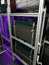 Mastervolt Li-ion batteries power this RV rental. A robust, modular electrical system with striking purple-lit components.