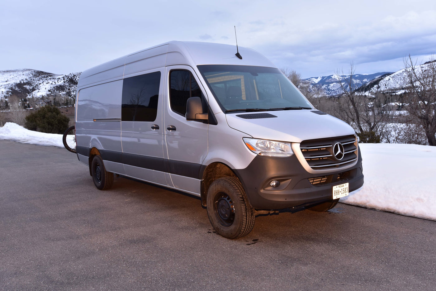  and front seating area for your journey.|Spacious RV rental interior: modern kitchen — photo 12
