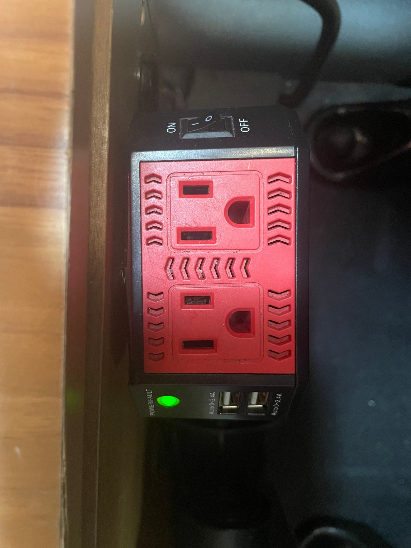 RV rental: Power inverter with red AC outlets, USB ports, and green power light, ready for charging devices while traveling. — photo 10