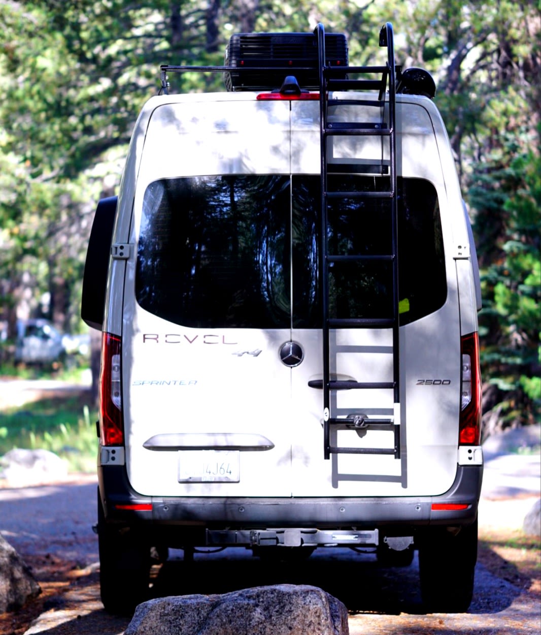  an RV rental ready for adventure & camping in nature.|A light-colored Mercedes Sprinter RV rental — photo 4