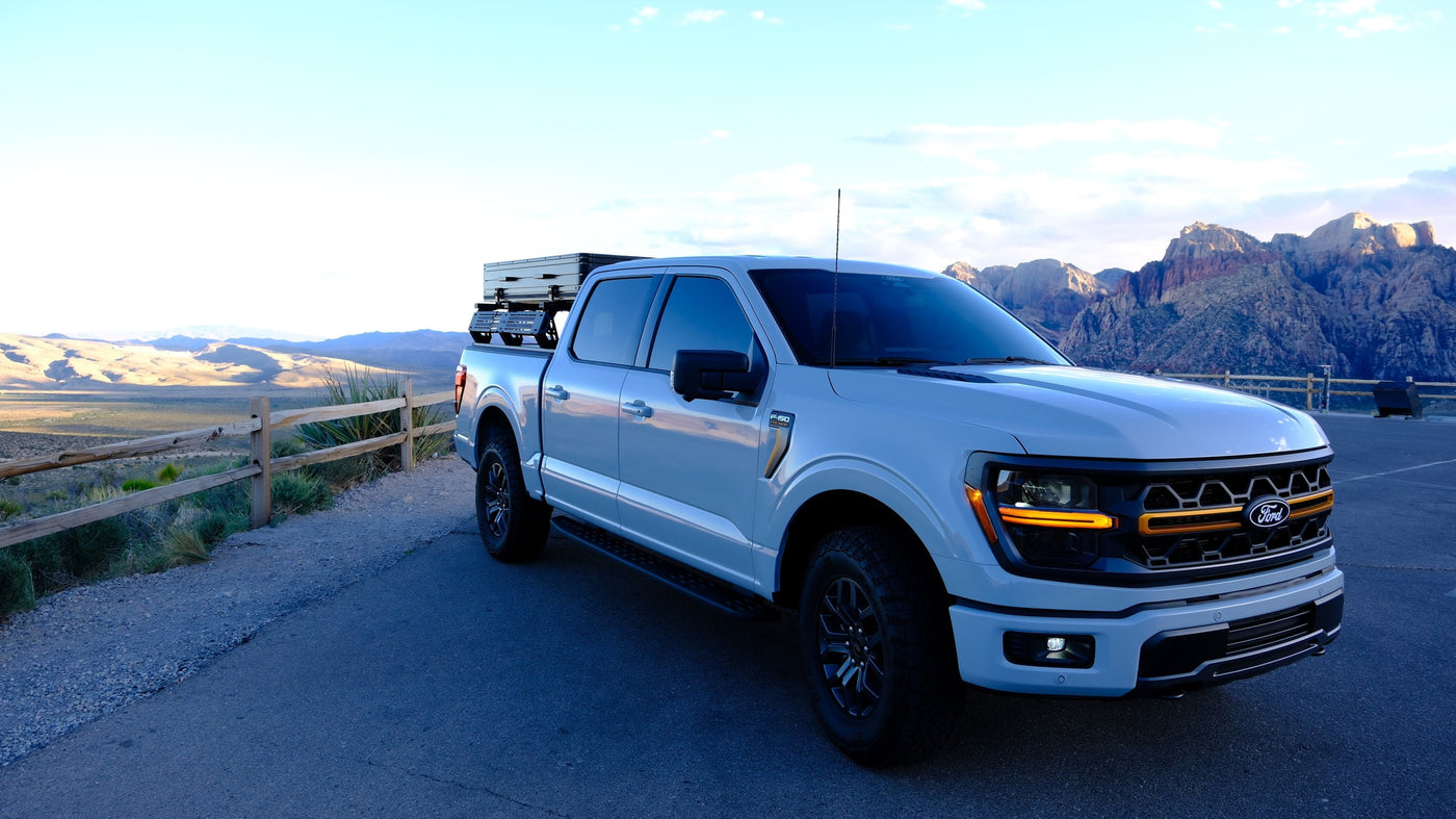 Explore mountains with this Ford F-150 rv rental, featuring a bed camper for desert adventures and scenic views. — photo 15