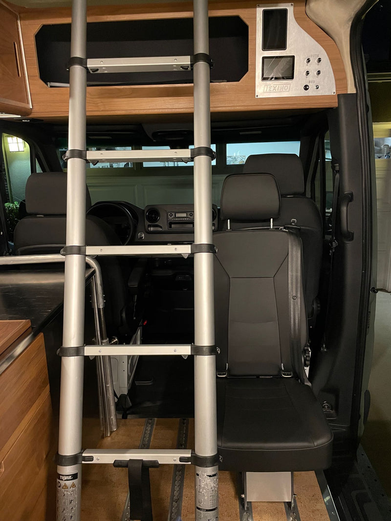  and window.|RV rental: Modern camper kitchen with sink — photo 6