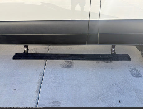 RV rental van with an extended Amp Research automatic power step, providing easy access to the vehicle.