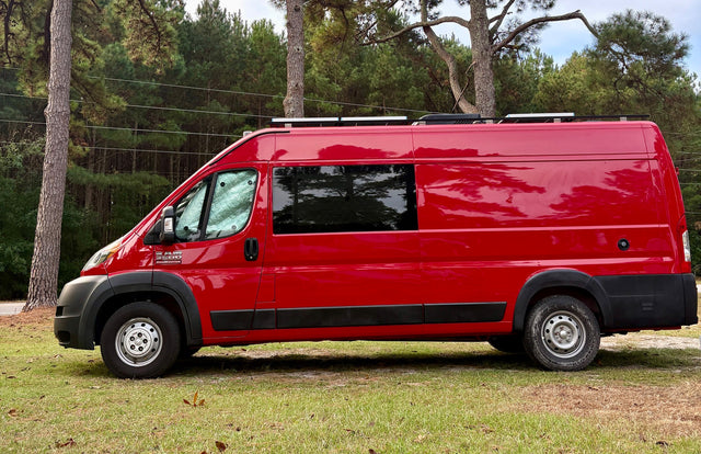  and a sleeping area. Ideal for camping & travel.|Red Ram ProMaster RV rental camper van