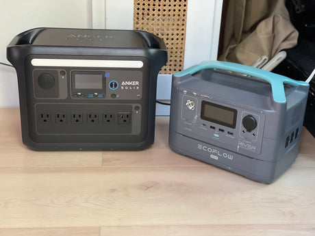 Two portable power stations, an Anker Solix and EcoFlow River Max, ideal for an RV rental or camping trips.