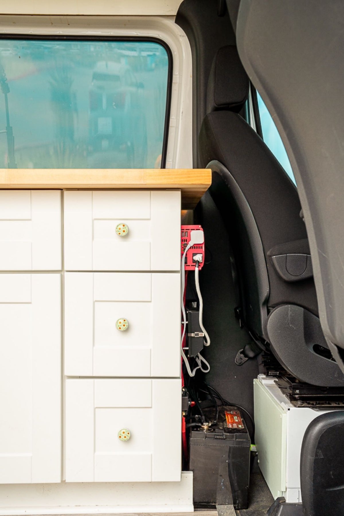  parked by the ocean. Perfect for road trips.|Rear view of a white Mercedes-Benz Sprinter van with a ladder — photo 9