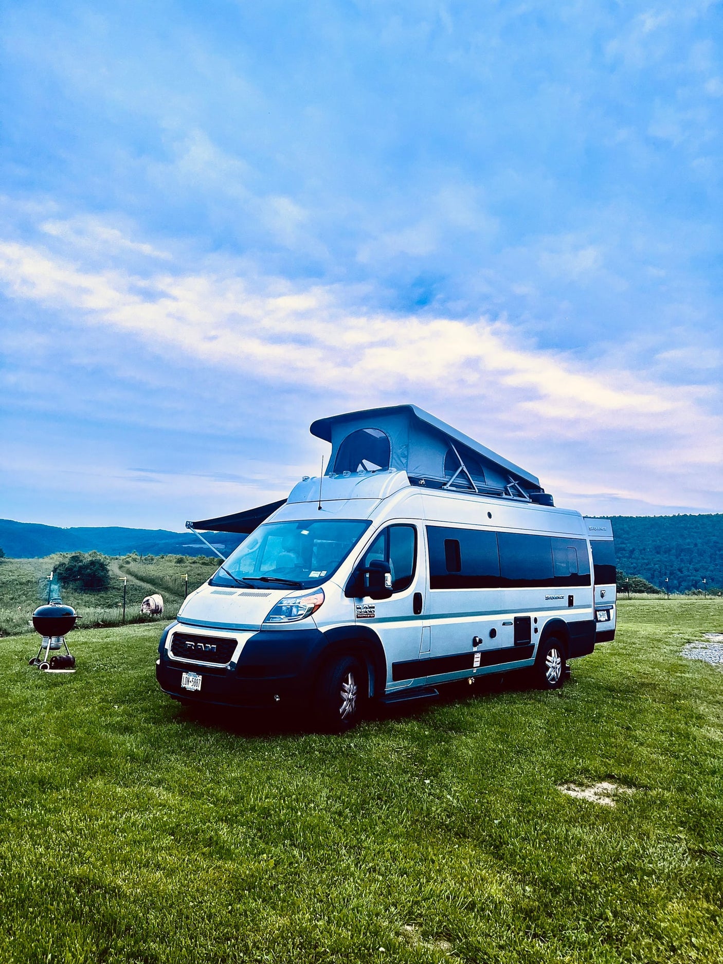  parked on gravel with palm trees & a sunny sky. Perfect for camping!|Inside a bright **rv rental**