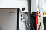 RV rental's rear utility panel features an outdoor shower and water hookups for convenient use.