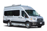 A bright silver Coachmen Beyond camper van, a Class B RV on a Ford Transit chassis, perfect for RV rental trips.